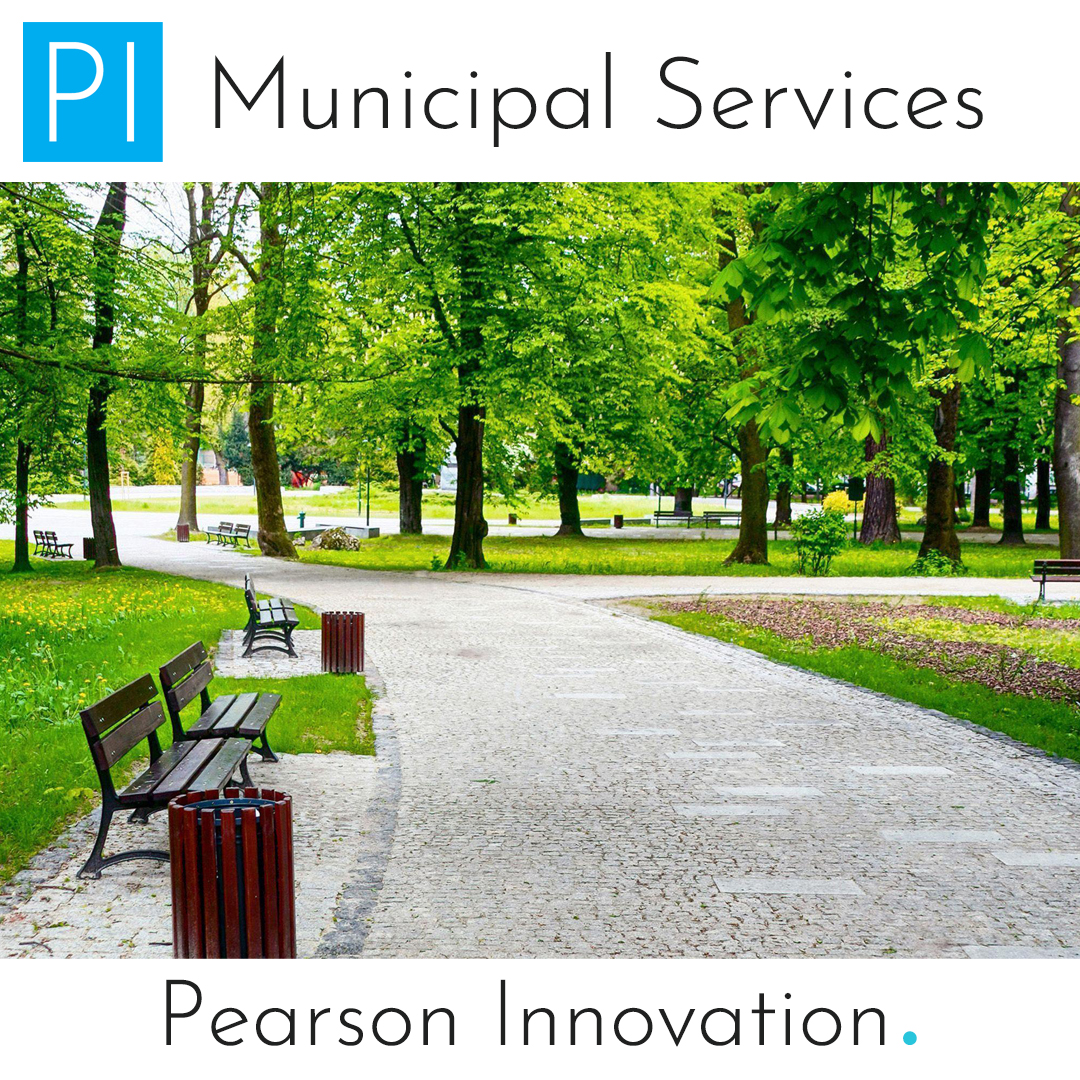 Paved path through a city park on a spring day